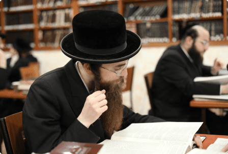 Belz Kollel man learning Torah